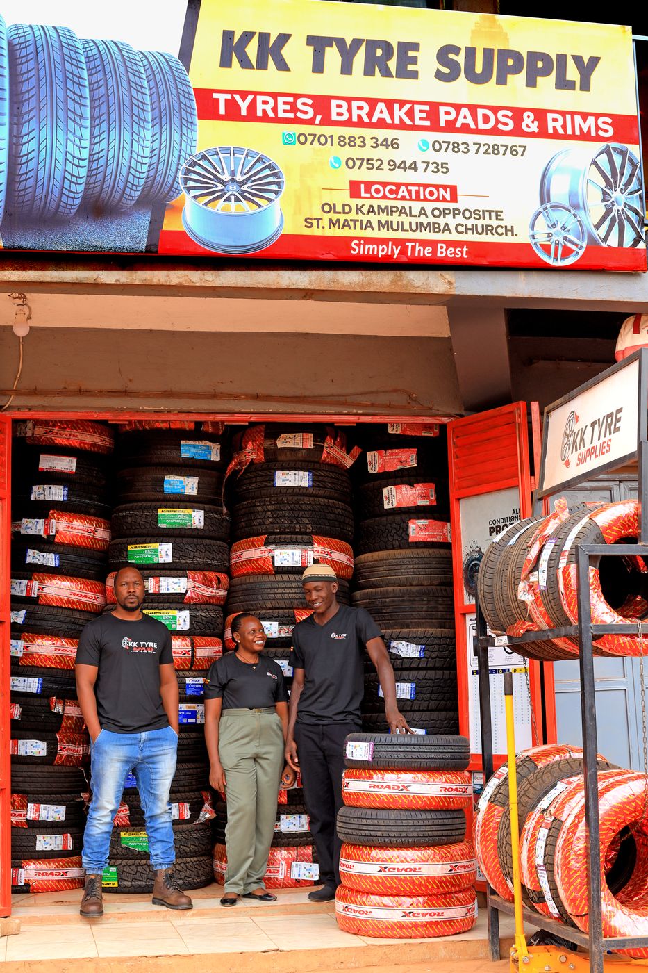 The KK Tyre Supplies shopfront and team in Old Kampala