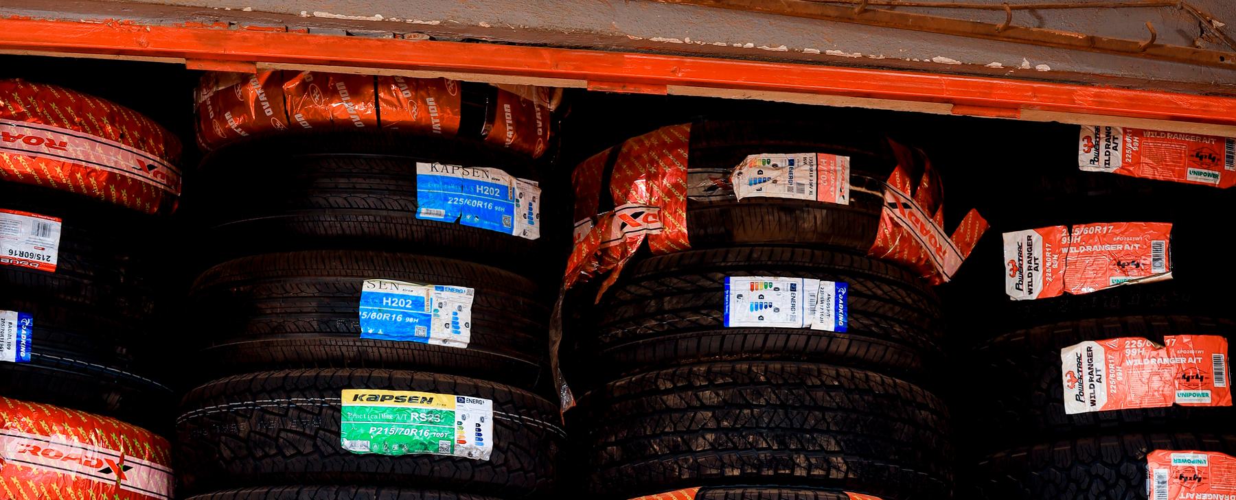 Tyres stacked floor to ceiling at KK Tyre Supplies